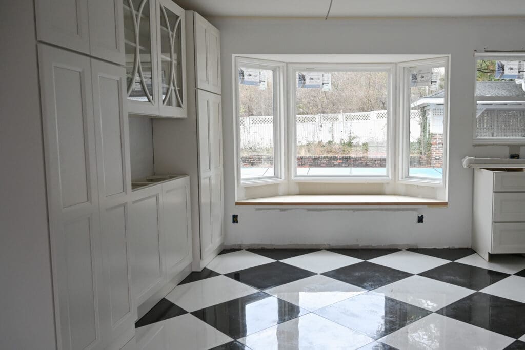 Knoxville custom kitchen with black and white checkered tile and a custom bay window.